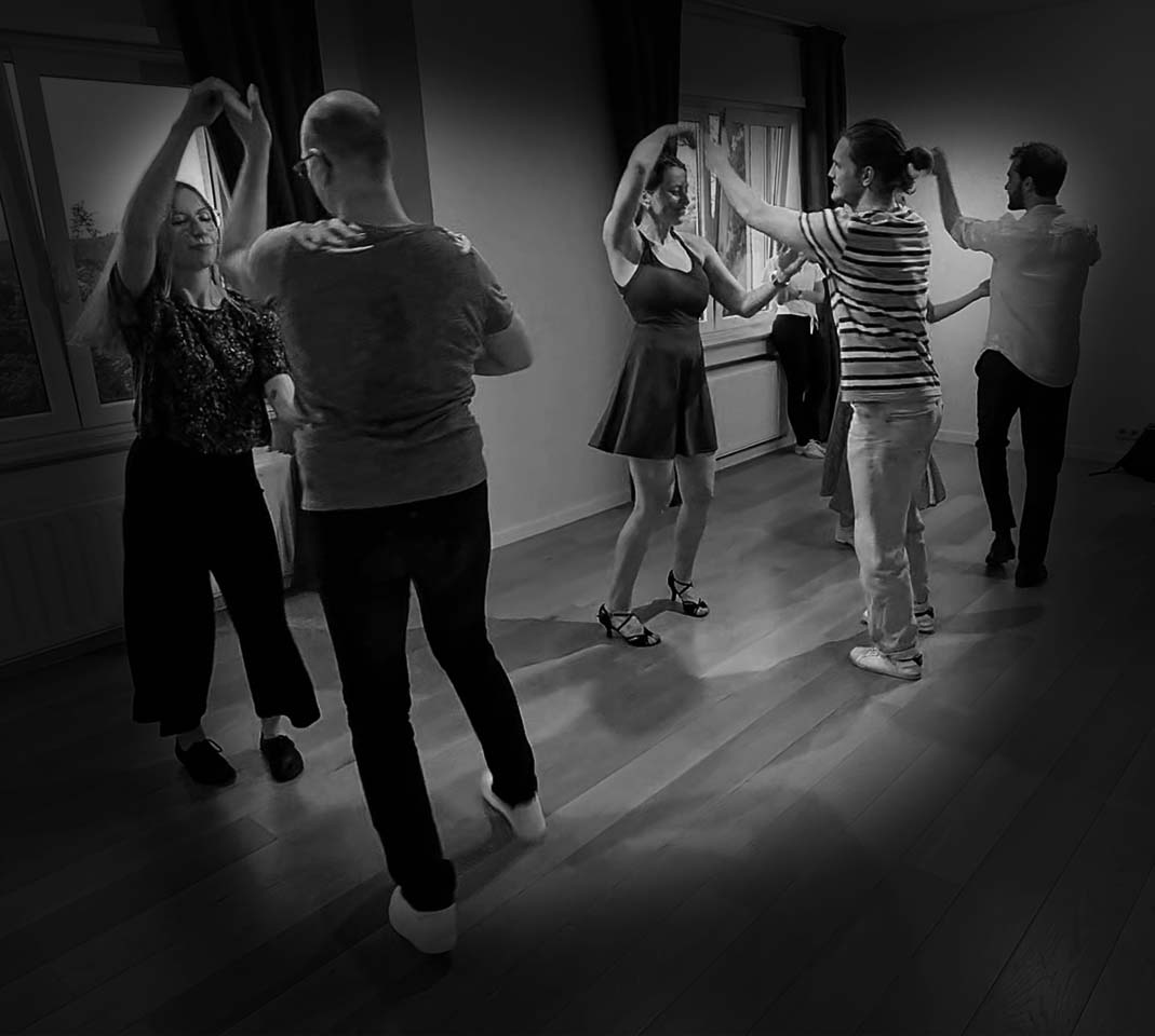 A couple dancing together during a private class at Lovania Dance Company
