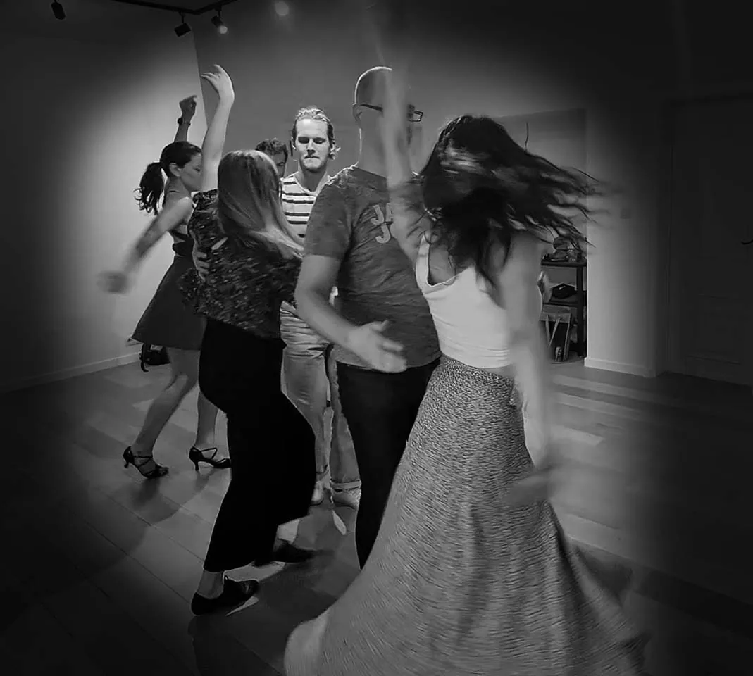 A group class at Lovania Dance Company mid-exercise